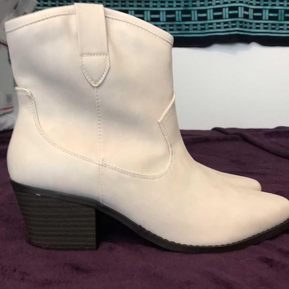 NWT mid-calf style cream boots.